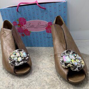 Poetic License London peep toe pumps with rhinestone embellishments. Size 41/10